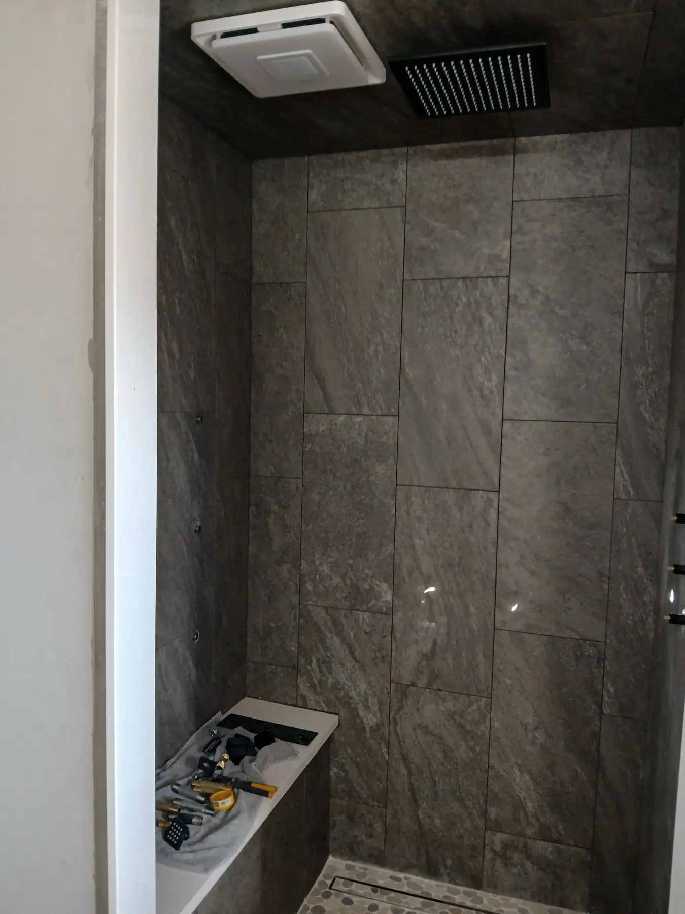 Slate tile shower with rain head
