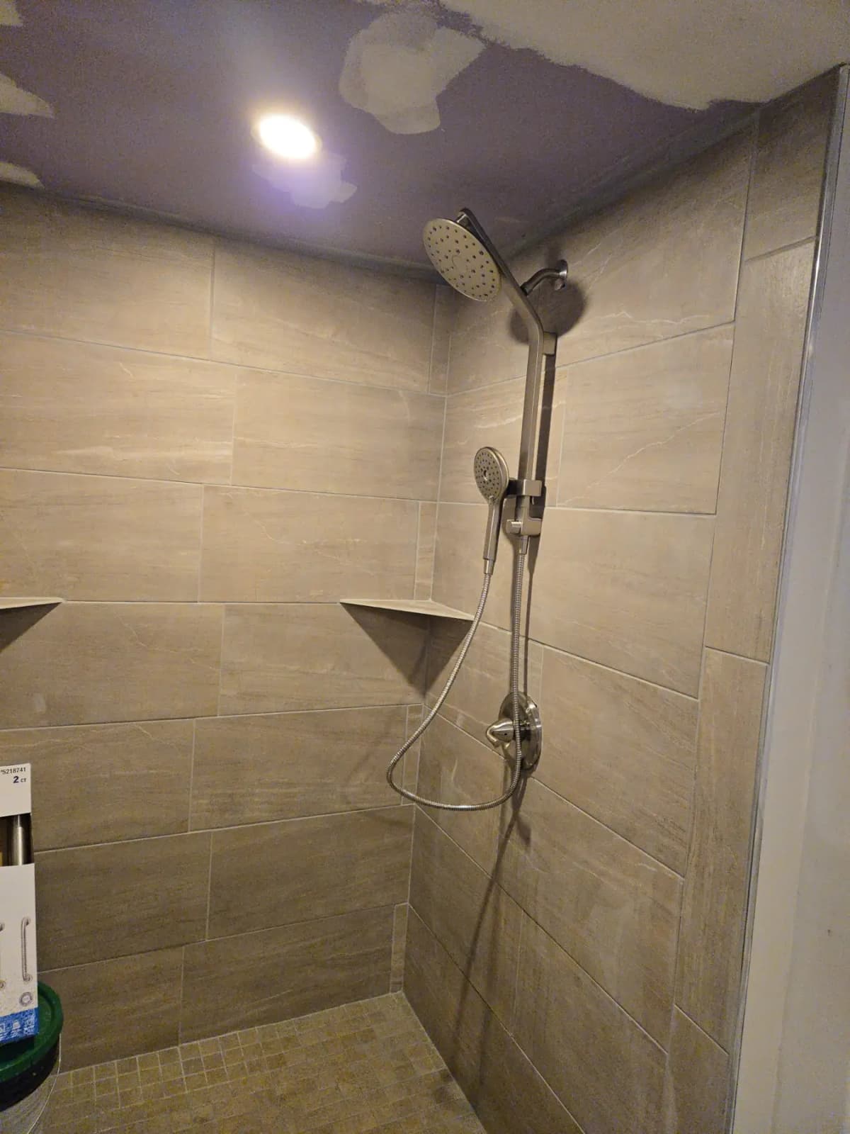 Tiled shower with dual shower heads